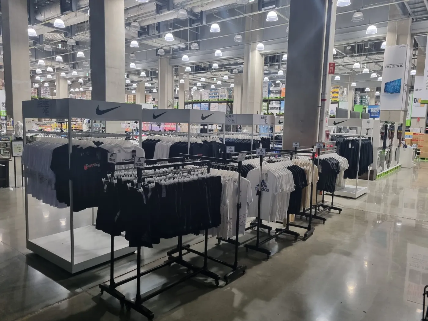 Apparel racks on the floor of a Korean big-box retail store
