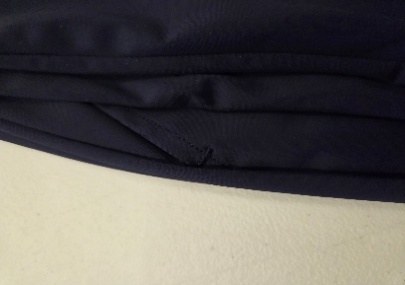 Defective hem seam